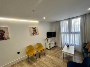 BAJO A habitación con literas Apartamentos JUAN ROBLEDO Centro Ciudad, Andujar